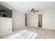 Carpeted secondary bedroom with ceiling fan and ample space at 3815 Pleasant Oaks Dr, Lawrenceville, GA 30044