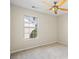 Bright bedroom with large window and neutral color scheme at 3815 Pleasant Oaks Dr, Lawrenceville, GA 30044