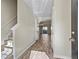 Inviting foyer with light-colored walls, wood-look floors, stairs, and an arched opening leading to the living area at 3815 Pleasant Oaks Dr, Lawrenceville, GA 30044