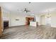 Spacious living room features hardwood floors, fireplace and ceiling fan at 3815 Pleasant Oaks Dr, Lawrenceville, GA 30044