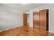 Bedroom with hardwood flooring and closet at 422 Derbyshire Dr, Stone Mountain, GA 30088