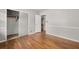 Bedroom featuring a closet and hardwood flooring at 422 Derbyshire Dr, Stone Mountain, GA 30088