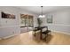 Eat-in kitchen featuring a dining area with sliding glass door leading to the outdoors at 422 Derbyshire Dr, Stone Mountain, GA 30088