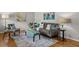 Cozy living room with stylish furnishings, area rug and hardwood floors at 422 Derbyshire Dr, Stone Mountain, GA 30088