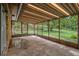 Enjoy the view from this screened in porch, perfect for relaxation or entertaining at 422 Derbyshire Dr, Stone Mountain, GA 30088