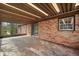 Brick home with a roomy screened-in porch perfect for outdoor enjoyment at 422 Derbyshire Dr, Stone Mountain, GA 30088