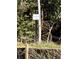 Walking trail sign surrounded by green foliage, indicating a scenic community path at 4655 Larkfield Way, Powder Springs, GA 30127