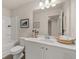 Well-lit bathroom featuring a vanity with ample counter space, a large mirror, and a shower-tub combination at 1186 Westhampton Way # 134, Villa Rica, GA 30180