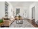 Bright living room featuring hardwood floors and neutral decor at 1712 Evans Sw Dr, Atlanta, GA 30310