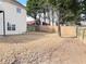 Large, fenced backyard with trees, offering privacy and space for outdoor activities at 3345 Stoneleigh Run Dr, Buford, GA 30519