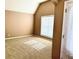 Cozy carpeted bedroom with natural light streaming through the window at 3345 Stoneleigh Run Dr, Buford, GA 30519