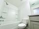 Clean bathroom featuring a shower-tub, toilet, vanity, and modern fixtures at 124 Auburn Run Ln, Auburn, GA 30011