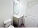 Modern bathroom with a vanity, sink, and toilet at 124 Auburn Run Ln, Auburn, GA 30011