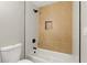 Modern bathroom featuring a geometric tile shower with a matte black shower head and fixtures at 1383 Palmer Sw Pl, Mableton, GA 30126