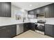 Elegant kitchen with stainless steel appliances and plenty of counter space at 1383 Palmer Sw Pl, Mableton, GA 30126