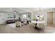 Combined living and dining area with ample seating and natural light at 1383 Palmer Sw Pl, Mableton, GA 30126