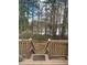 Wooden deck overlooking a treed backyard, offering outdoor living at 361 Oak Harbor Trl, Marietta, GA 30066