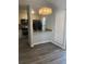 Dining area features modern lighting fixture and hardwood flooring at 361 Oak Harbor Trl, Marietta, GA 30066