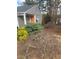 Charming home exterior with well-maintained landscaping and colorful plants at 361 Oak Harbor Trl, Marietta, GA 30066