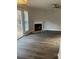 Spacious living room with fireplace and access to outdoor area at 361 Oak Harbor Trl, Marietta, GA 30066