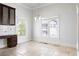 Cozy dining area with modern chandelier and natural light from the windows at 640 Irwin Ne St, Atlanta, GA 30312