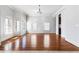 Bright, open living room with hardwood floors, crown molding, and multiple windows at 640 Irwin Ne St, Atlanta, GA 30312