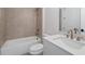 Bathroom with a tub and shower combination and a white vanity at 537 Pearl St, Cumming, GA 30040