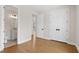 Bedroom boasts hardwood floors, closet, and an ensuite bathroom for convenience at 537 Pearl St, Cumming, GA 30040