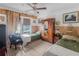 Bedroom with two beds and hardwood wardrobe at 799 Moreland Se Ave, Atlanta, GA 30316