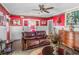 Inviting living room featuring a comfortable leather couch, ornate decor, and a warm atmosphere at 799 Moreland Se Ave, Atlanta, GA 30316