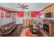 Bright living room featuring modern furniture, a fireplace, and stylish decorative accents at 799 Moreland Se Ave, Atlanta, GA 30316