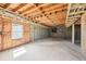 Unfinished basement; features concrete flooring and wooden beams at 1600 Spring Arbor Sw Ct, Lilburn, GA 30047