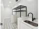 Contemporary bathroom with walk-in shower, unique tile flooring, and modern vanity at 1600 Spring Arbor Sw Ct, Lilburn, GA 30047