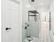 Stylish bathroom featuring a glass shower, modern gray tiles, and a sleek design at 1600 Spring Arbor Sw Ct, Lilburn, GA 30047