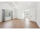 Open floor plan with wood floors, high ceilings, large windows, and lots of light at 1600 Spring Arbor Sw Ct, Lilburn, GA 30047
