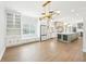 Open floor plan that showcases the island and spacious kitchen area with bar-stool seating at 1600 Spring Arbor Sw Ct, Lilburn, GA 30047