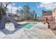 Private pool with concrete patio and waterslide; great for entertaining and relaxation at 1600 Spring Arbor Sw Ct, Lilburn, GA 30047