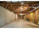 Unfinished basement showcasing exposed framing and concrete walls at 6111 Sequoia Ln, Douglasville, GA 30135