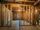 Unfinished basement showcasing the layout of the space with exposed framing at 6111 Sequoia Ln, Douglasville, GA 30135