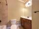 Neutral toned bathroom with a shower-tub combo and bright lighting at 6111 Sequoia Ln, Douglasville, GA 30135