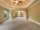 Bonus room with tray ceiling, carpeting, and recessed lighting at 6111 Sequoia Ln, Douglasville, GA 30135