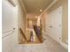 Upstairs hallway with carpet and views of the foyer at 6111 Sequoia Ln, Douglasville, GA 30135