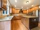 Gourmet kitchen featuring custom cabinets, granite countertops and modern appliances at 6111 Sequoia Ln, Douglasville, GA 30135