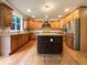 Modern kitchen with stainless steel appliances, granite countertops, and a center island at 6111 Sequoia Ln, Douglasville, GA 30135