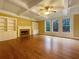 Spacious living room with fireplace, built-in shelving, and natural light at 6111 Sequoia Ln, Douglasville, GA 30135