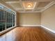 Living room with coffered ceilings and large windows at 6111 Sequoia Ln, Douglasville, GA 30135