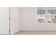 Bright bedroom features plush carpet and double window at 436 Reflection Dr # 15, Stockbridge, GA 30281