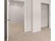 This carpeted bedroom features white walls, trim and doors, plus a closet for ample storage space at 436 Reflection Dr # 15, Stockbridge, GA 30281