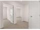 Upstairs hallway with access to multiple bedrooms, offering ample space and privacy at 436 Reflection Dr # 15, Stockbridge, GA 30281