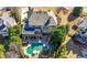 Expansive backyard features a private pool, jacuzzi, patio, sun panels and lush landscaping at 5120 Parkwood Oaks Ln, Smyrna, GA 30126